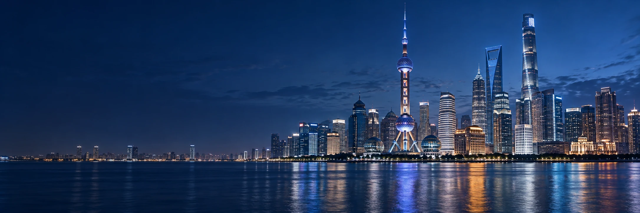 Shanghai’s Pudong skyline and Huangpu River at blue hour